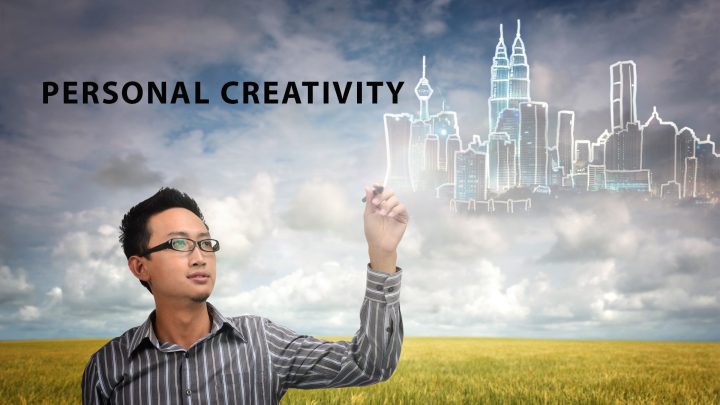 Man Demonstrating Personal Creativity by Creating Cityscapes in the Air
