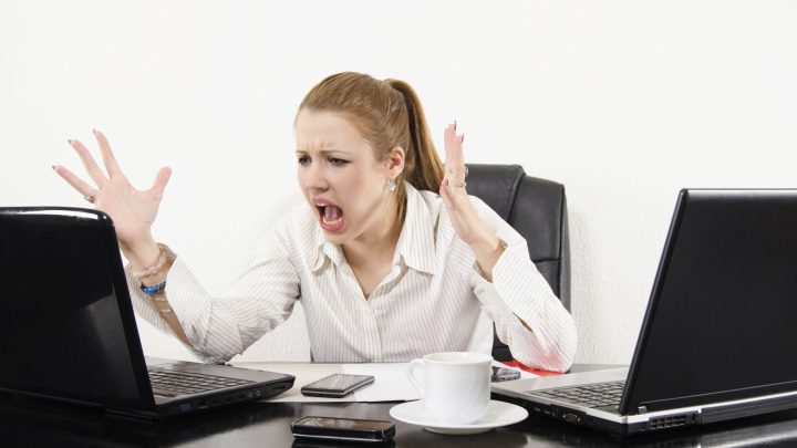 Frustrated Woman Having Difficulty Coping with Modern Stress